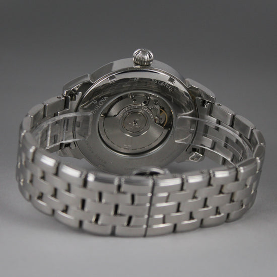Bulova automatic watch with a convenient GMT feature, a beautiful original Bulova steel bracelet and a textured dial.