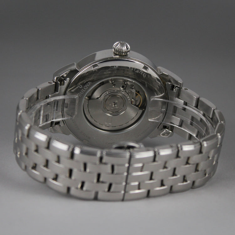 Bulova automatic watch with a convenient GMT feature, a beautiful original Bulova steel bracelet and a textured dial.