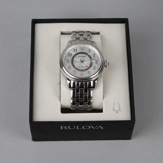 Bulova automatic watch with a convenient GMT feature, a beautiful original Bulova steel bracelet and a textured dial.