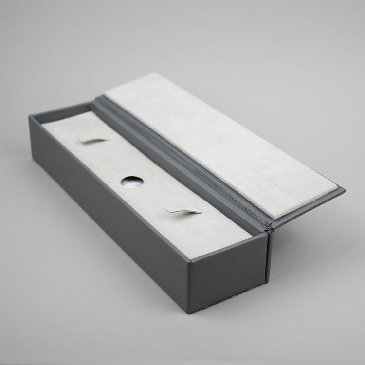 Grey Certina watch box.