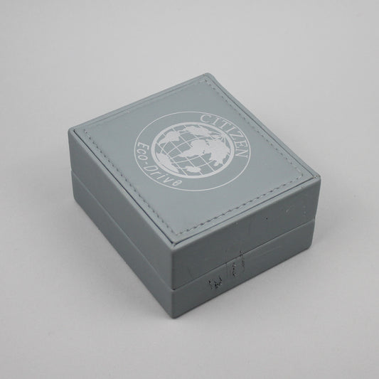 Citizen Eco-Drive light grey watch box.