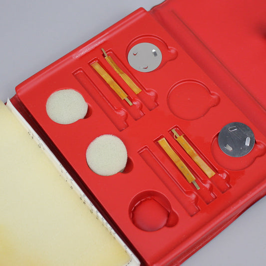 Etic tool set parts and tools on the slots.