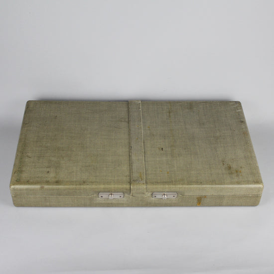 Hard canvas vintage light green Girard Perregaux watch case.