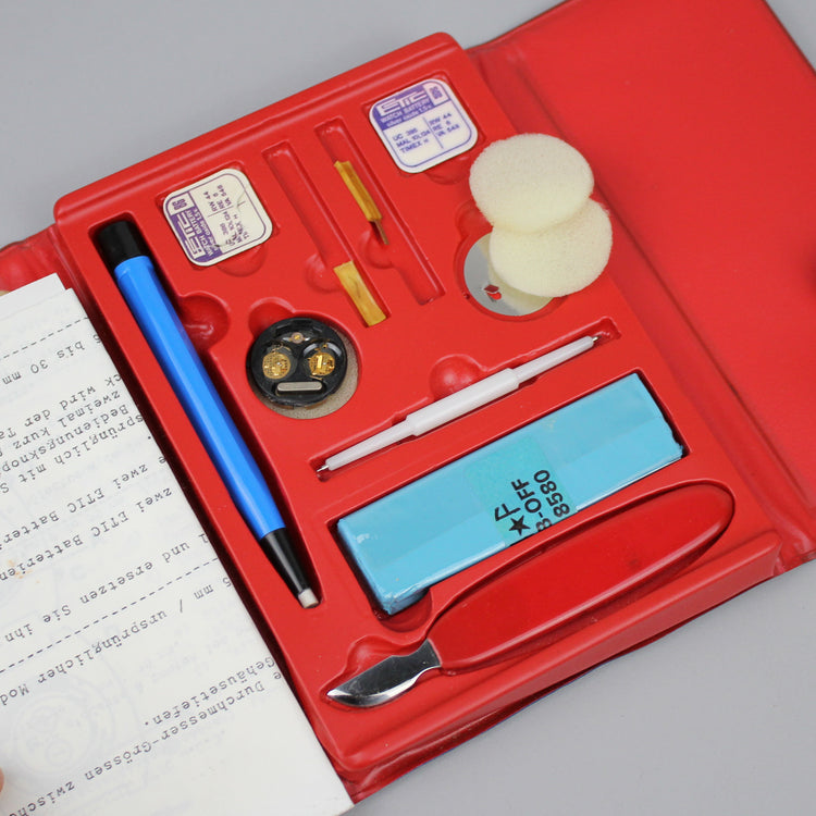 Etic tool set parts and tools on the slots.