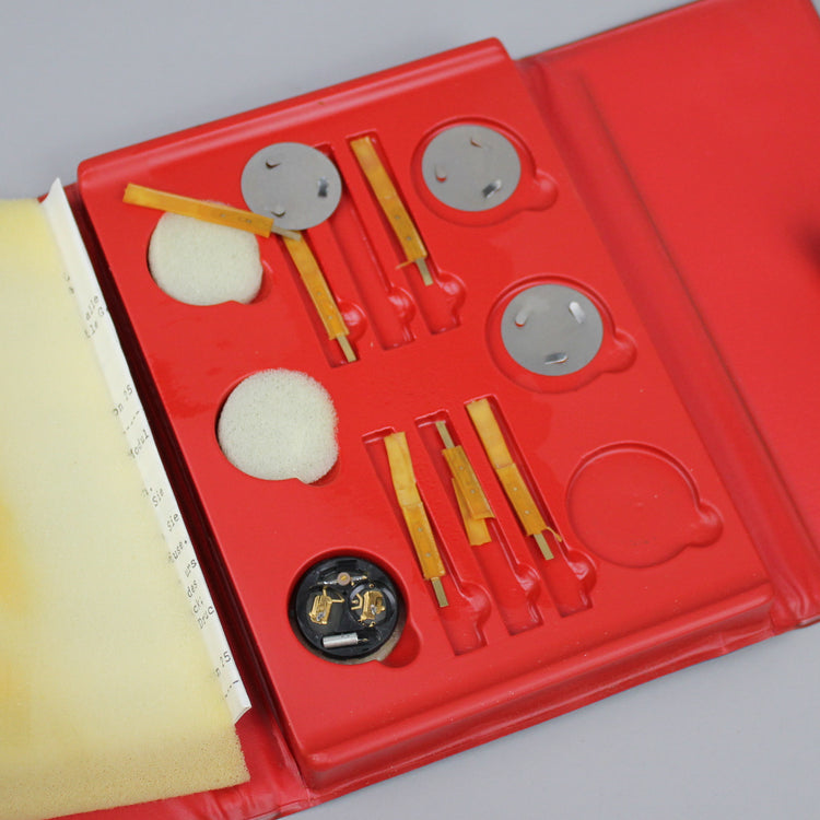 Etic tool set parts and tools on the slots.