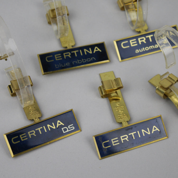 Vintage Certina watch watch stands.