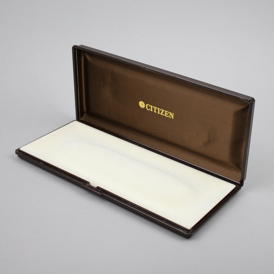 Brown palstic Citizen watch box.