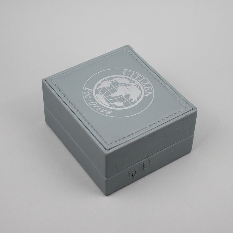 Citizen Eco-Drive light grey watch box.