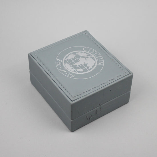Citizen Eco-Drive light grey watch box.