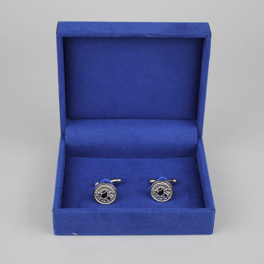 Magnificent Grand Seiko cufflinks in their fine open box, which will crown any outfit.