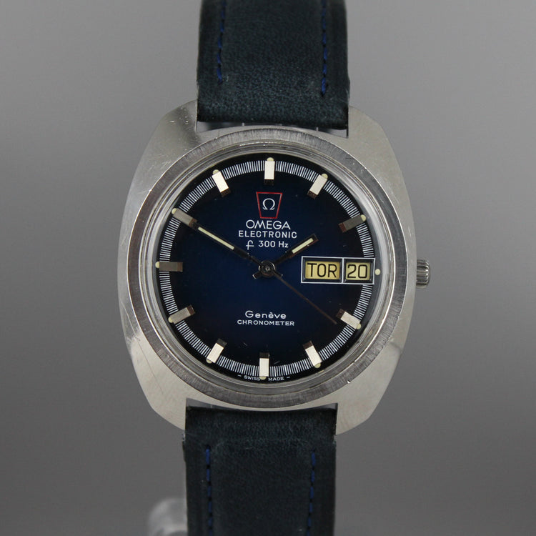 Omega electronic geneve chronometer with deep blue dial and steel case from front.