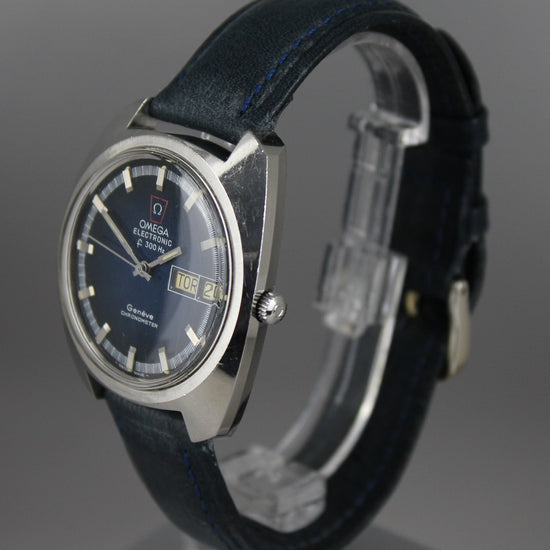 Omega electronic geneve chronometer with deep blue dial and steel case from right.