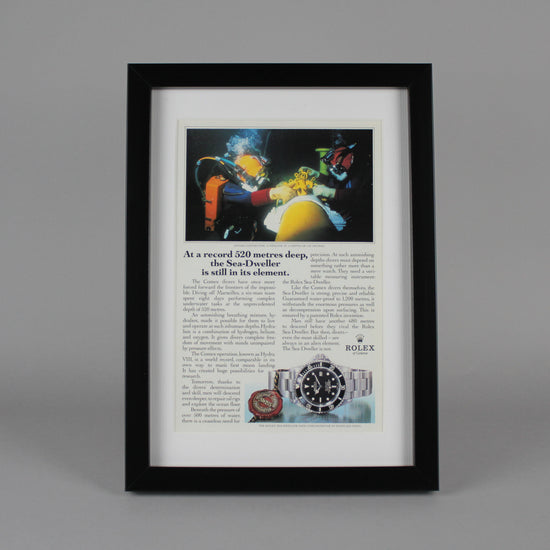 Framed old Rolex magazine advertisement color front