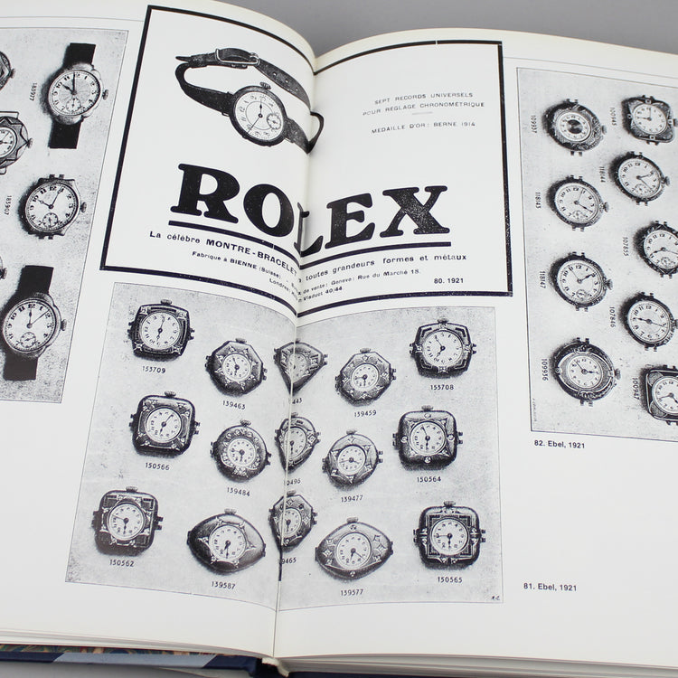 Swiss Wristwatches book back page full of vintage Rolex images.