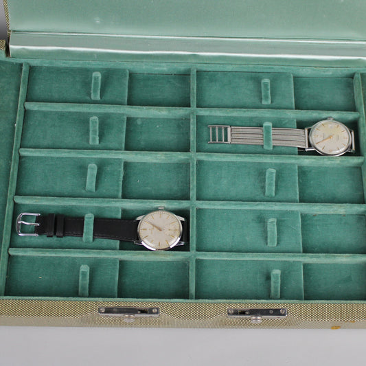 Detail of vintage light green Girard Perregaux watch case. 