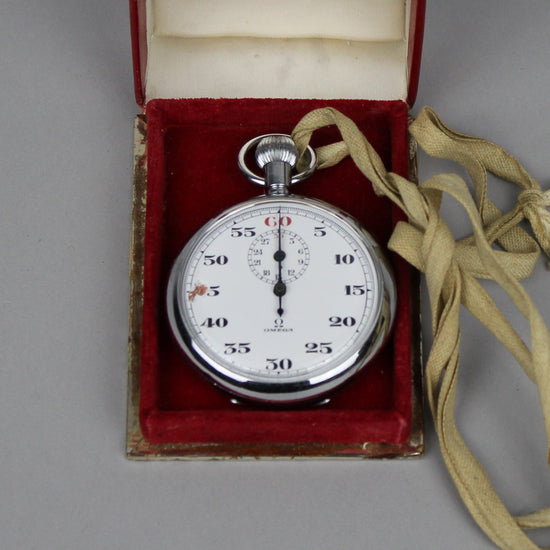 Vintage Omega stopwatch full set front