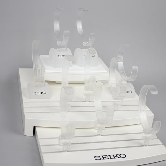 white seiko watch stand detail